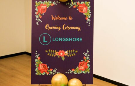 5D8A9065 Longshore Labs Chennai Development Center inauguration welcome board with festive decorations.